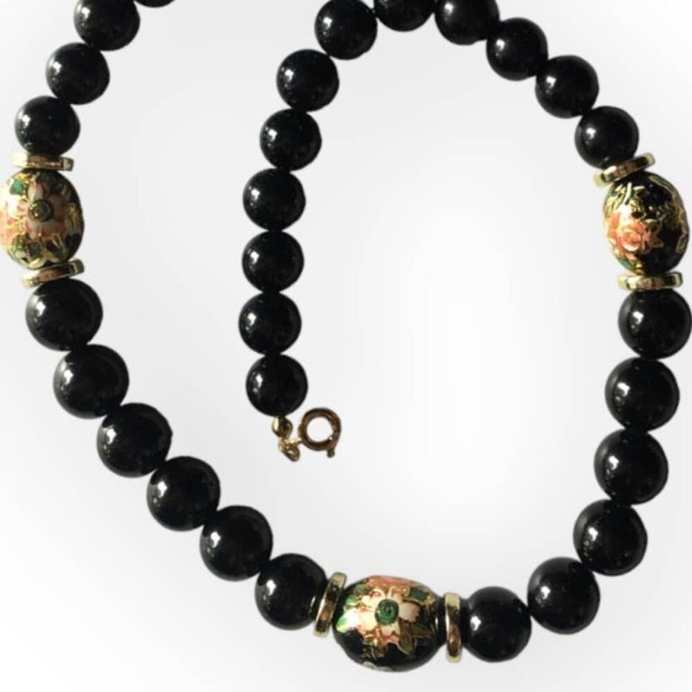Black plastic beaded necklace, floral accent beads